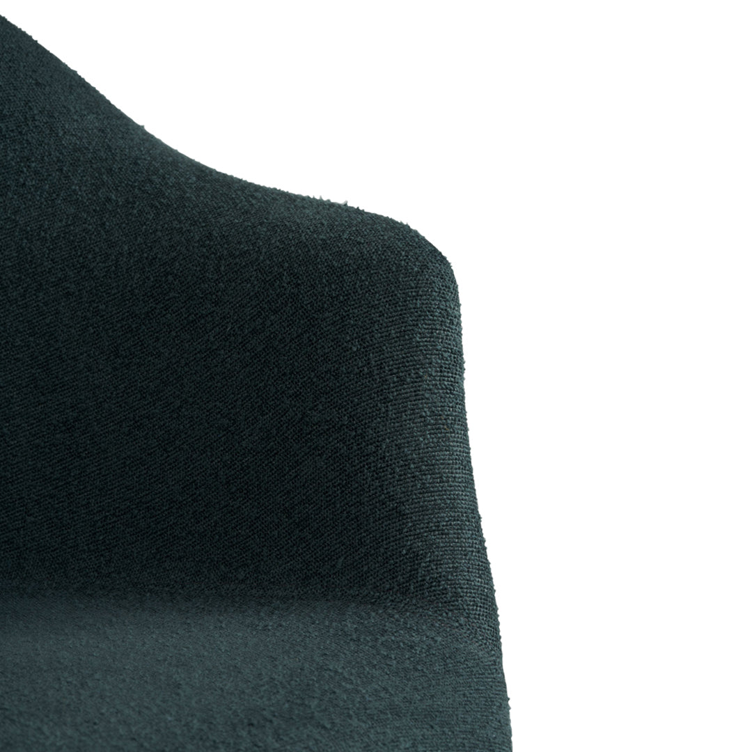 Dark green textured fabric with a smooth finish, ideal for modern decor accents. Perfect for stylish interior designs.