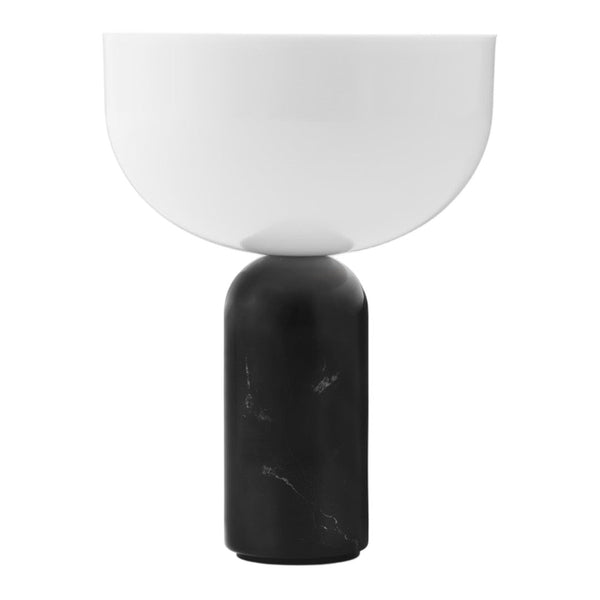 Modern table lamp featuring a glossy white shade and a sleek black marble base. Stylish and minimalistic design.
