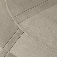 Beige area rug featuring soft textures and geometric patterns, perfect for elevating any living space.