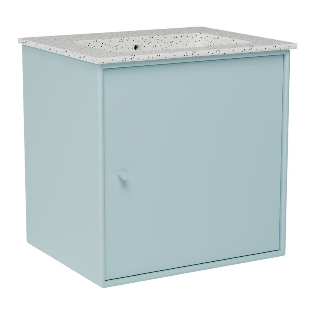 Light blue cabinet with a speckled white countertop, perfect for modern decor.