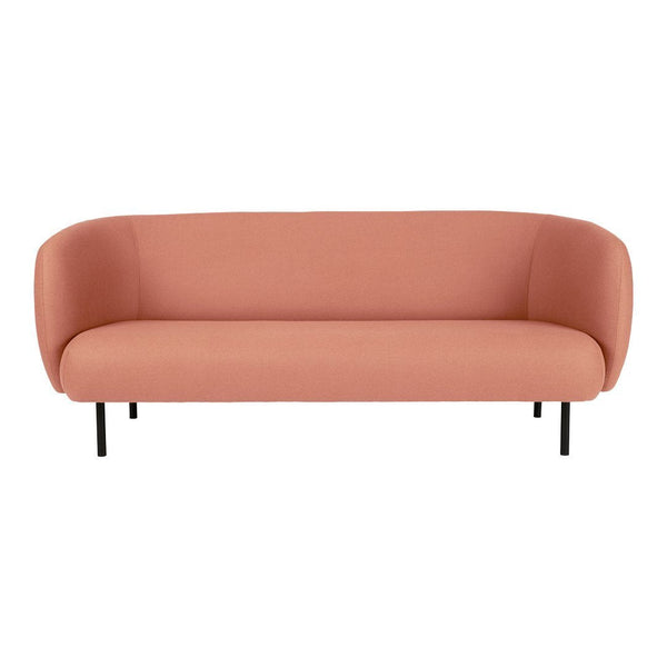 Curved peach sofa with a smooth fabric finish and sleek black legs, perfect for modern interiors.