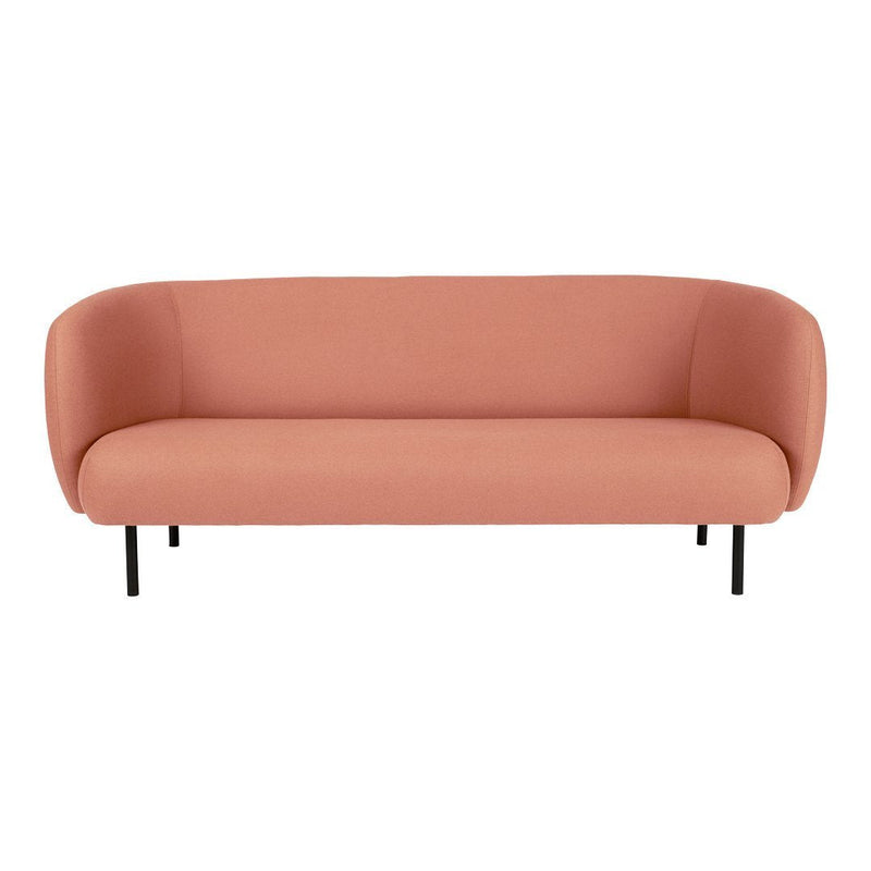 Curved peach sofa with a smooth fabric finish and sleek black legs, perfect for modern interiors.