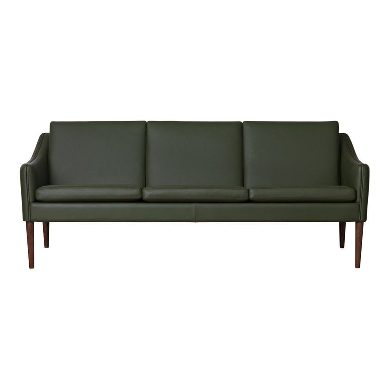 Green leather sofa with a sleek, modern design and wooden legs, featuring a clean, minimalist aesthetic.