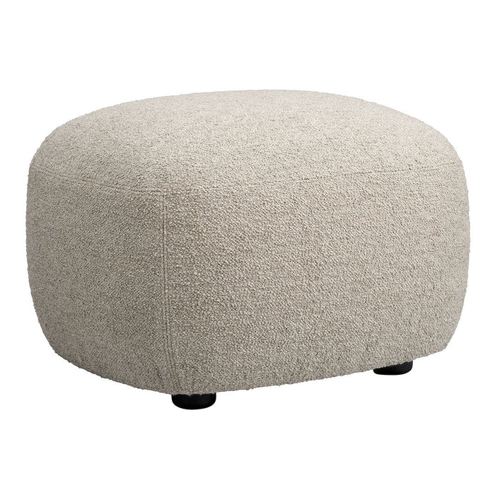 Cream textured ottoman with rounded shape and soft, fuzzy surface, featuring black feet. Perfect for stylish decor.