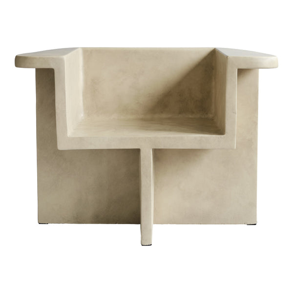 Beige concrete chair with a modern geometric design and smooth matte finish. Perfect for contemporary spaces.