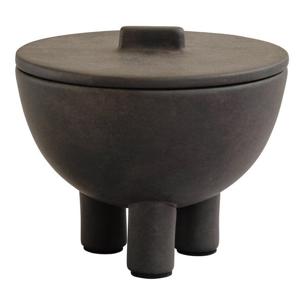 Black ceramic bowl with lid and three short legs, featuring a matte finish and smooth, rounded design.