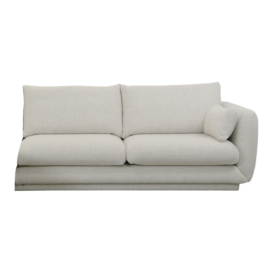Light beige modern sofa with soft, seamless cushions and a curved armrest design, perfect for any living space.