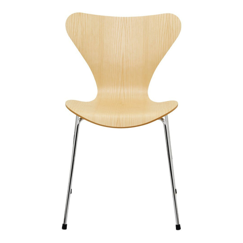 Natural wood chair with a light maple finish and smooth, modern lines. Chrome legs add a contemporary touch.