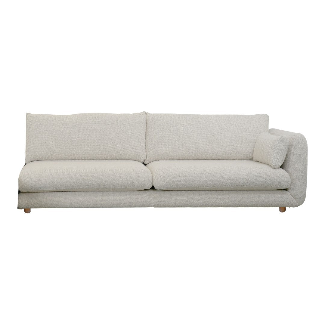 Light beige upholstered sofa with smooth texture and simple, modern design. Perfect for any living room decor.