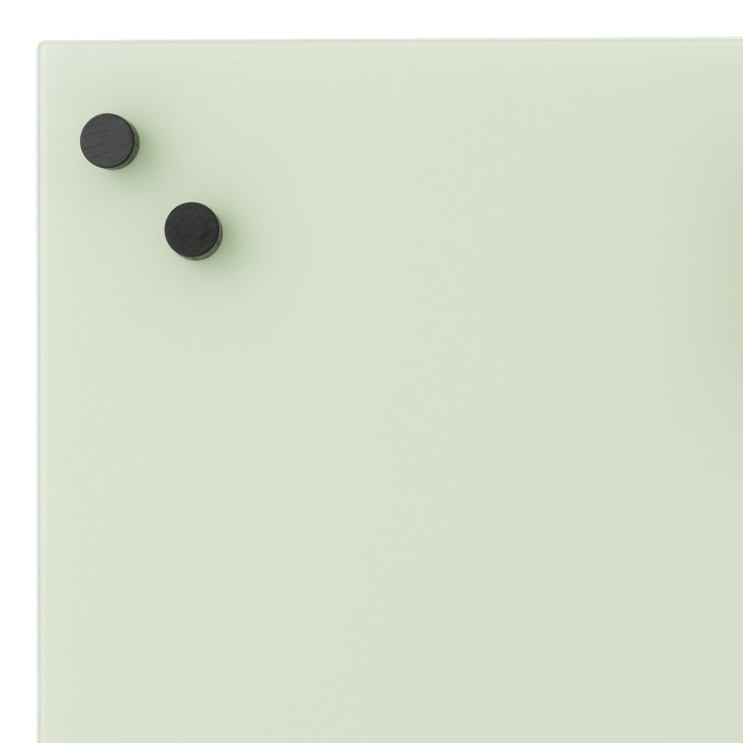Light green background with two black circular knobs, creating a modern and minimalist design.