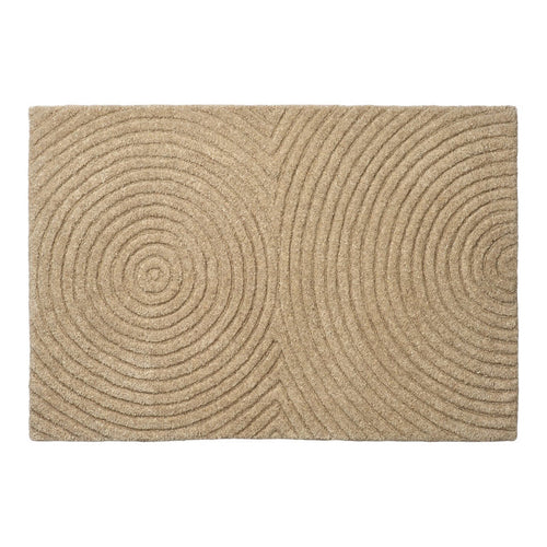 Beige area rug with circular patterns, featuring textured grooves and a modern design for stylish interiors.