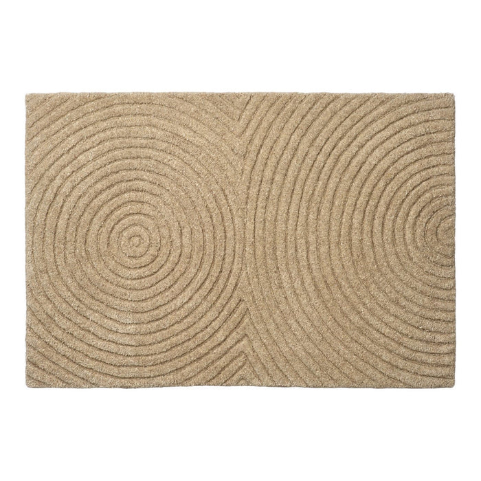 Beige area rug with circular patterns, featuring textured grooves and a modern design for stylish interiors.