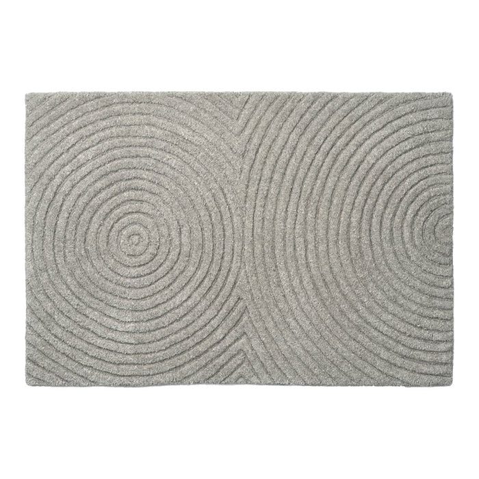 Light gray area rug with textured concentric circle pattern for a modern and stylish decor upgrade.