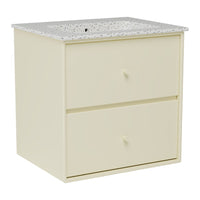 Cream-colored dresser with a speckled white and gray patterned top and two drawers.