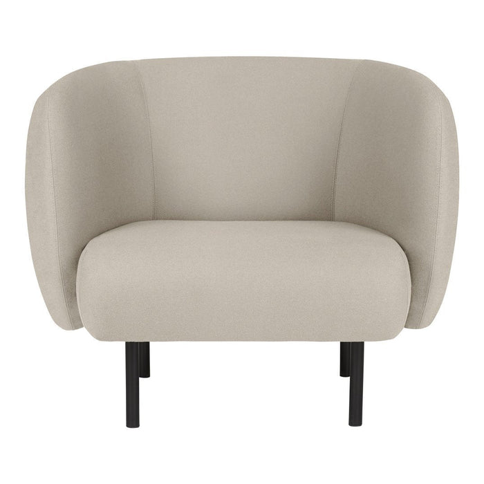 Beige upholstered chair with smooth contours and black legs, perfect for modern minimalist decor.