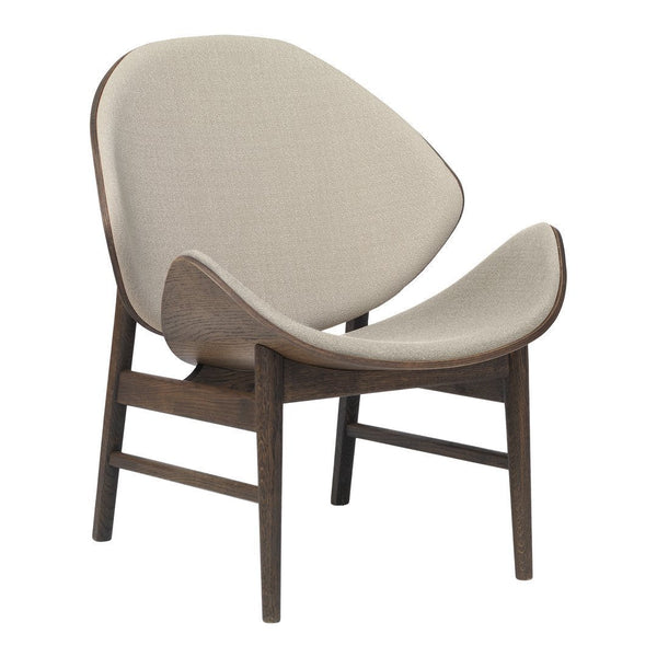 Beige fabric chair with a smooth, curved design and dark wood legs, perfect for modern decor.