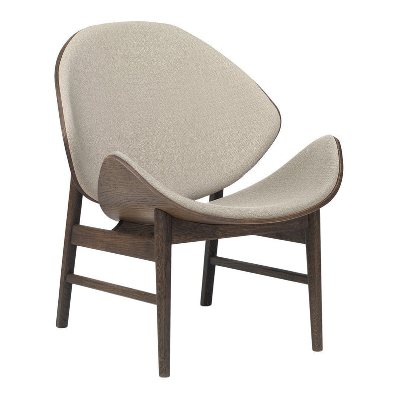 Beige fabric chair with a smooth, curved design and dark wood legs, perfect for modern decor.
