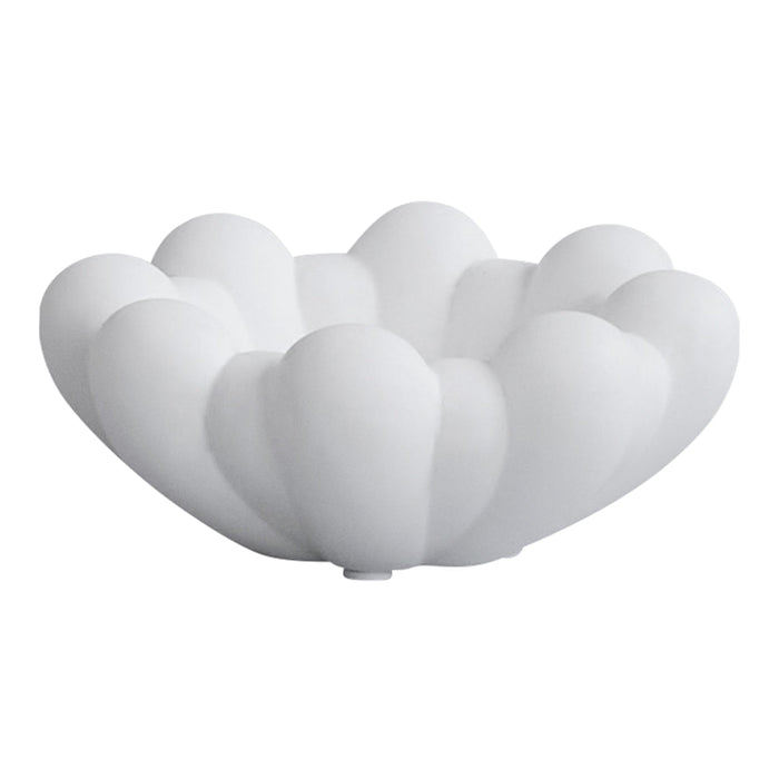 White cloud-shaped bowl with smooth, rounded edges and elegant, petal-like pattern. Perfect for modern decor.
