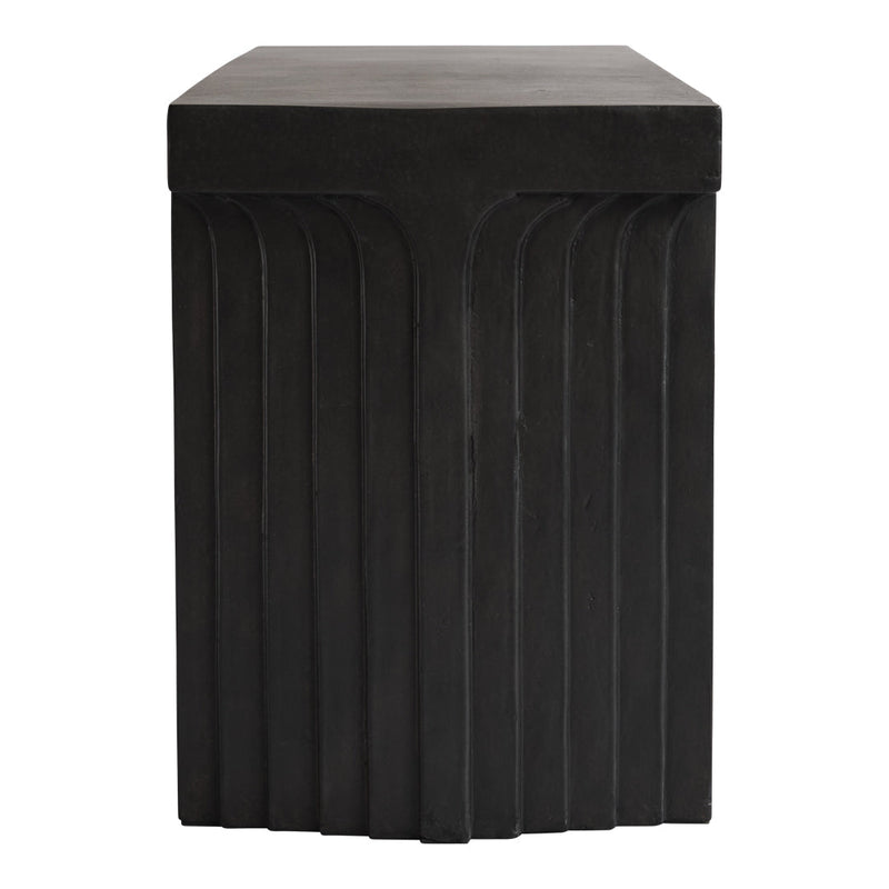 Black textured hexagonal stool with ribbed design, perfect for modern decor.