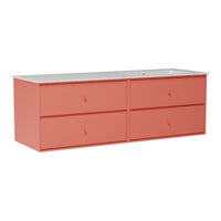 Coral-colored dresser with a smooth white top and minimalist design featuring four drawers.