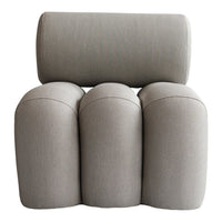 Light gray upholstery with smooth, rounded shapes and subtle stitching details, perfect for modern interiors.