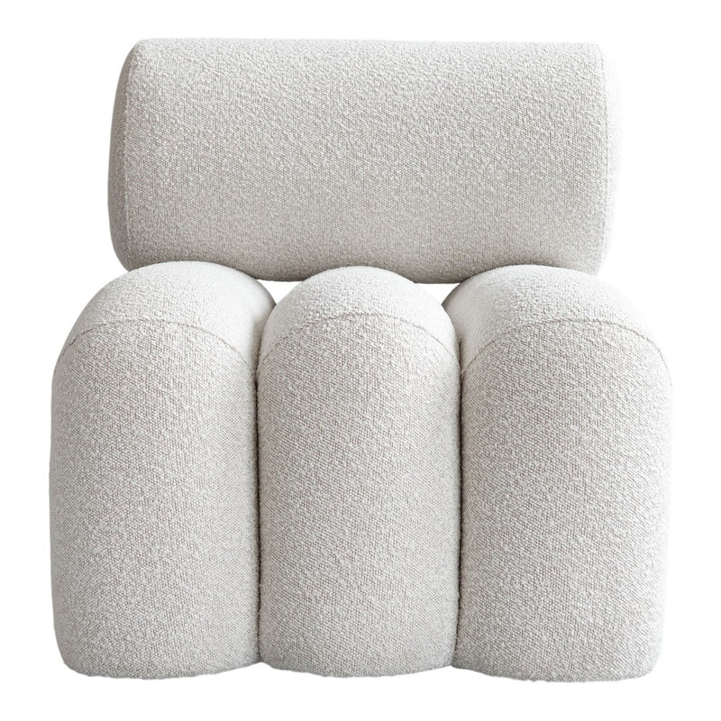Cream textured cushion chair with rounded edges and a soft, cozy pattern. Perfect for modern living spaces.