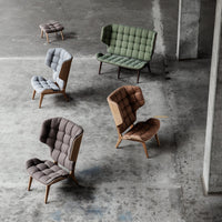 "Collection of tufted chairs in gray, green, brown, and beige, showcasing modern design and unique patterns."
