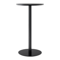 Sleek black bar table with a round top, minimalist design and smooth finish, perfect for modern decor.