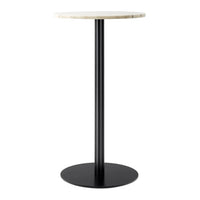 Round marble top in cream with a sleek black metal base, perfect for modern decor. 