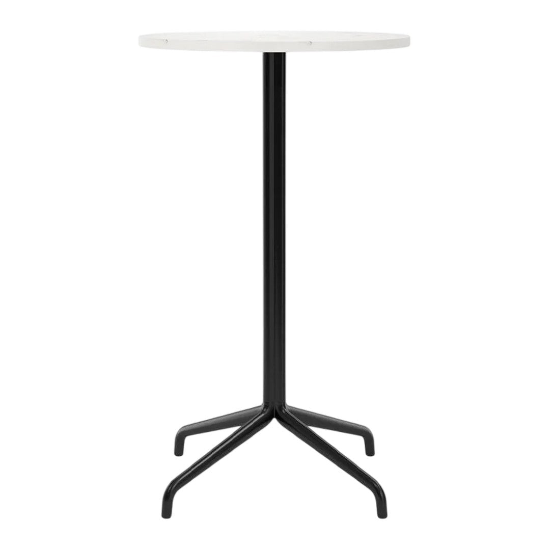 Round white tabletop on a sleek black metal base, featuring a minimalist and modern design. Perfect for any decor.