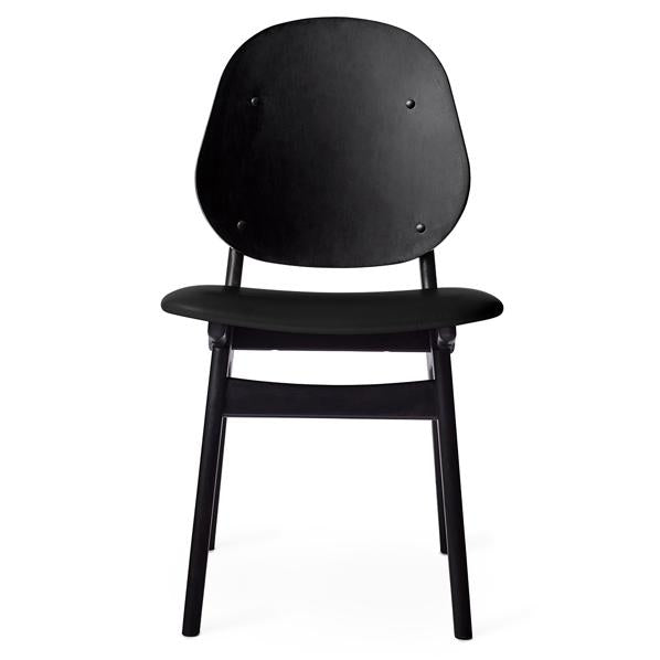 Black minimalist dining chair with a smooth, matte finish and simple, modern design.