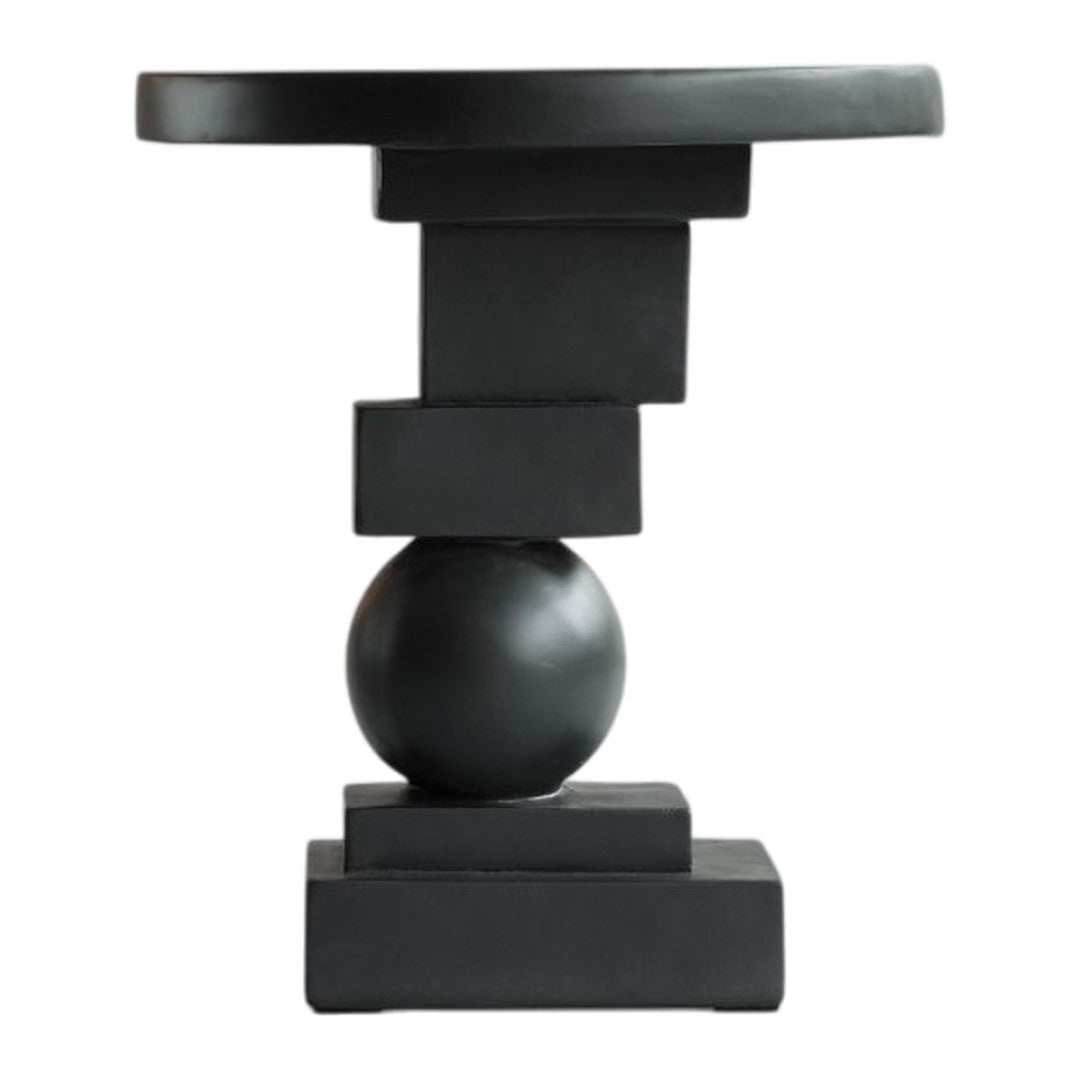 Sleek black side table featuring geometric patterns with a round top and sculptural base. Perfect modern accent piece.