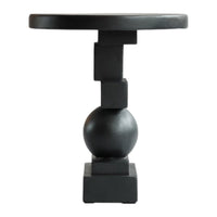 Black geometric accent table with a round top, spherical and cube-shaped base, showcasing a sleek, modern design.