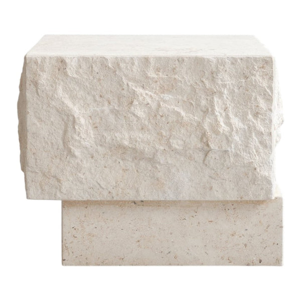 Textured light beige stone block with a rough surface and subtle speckles, perfect for modern decor.