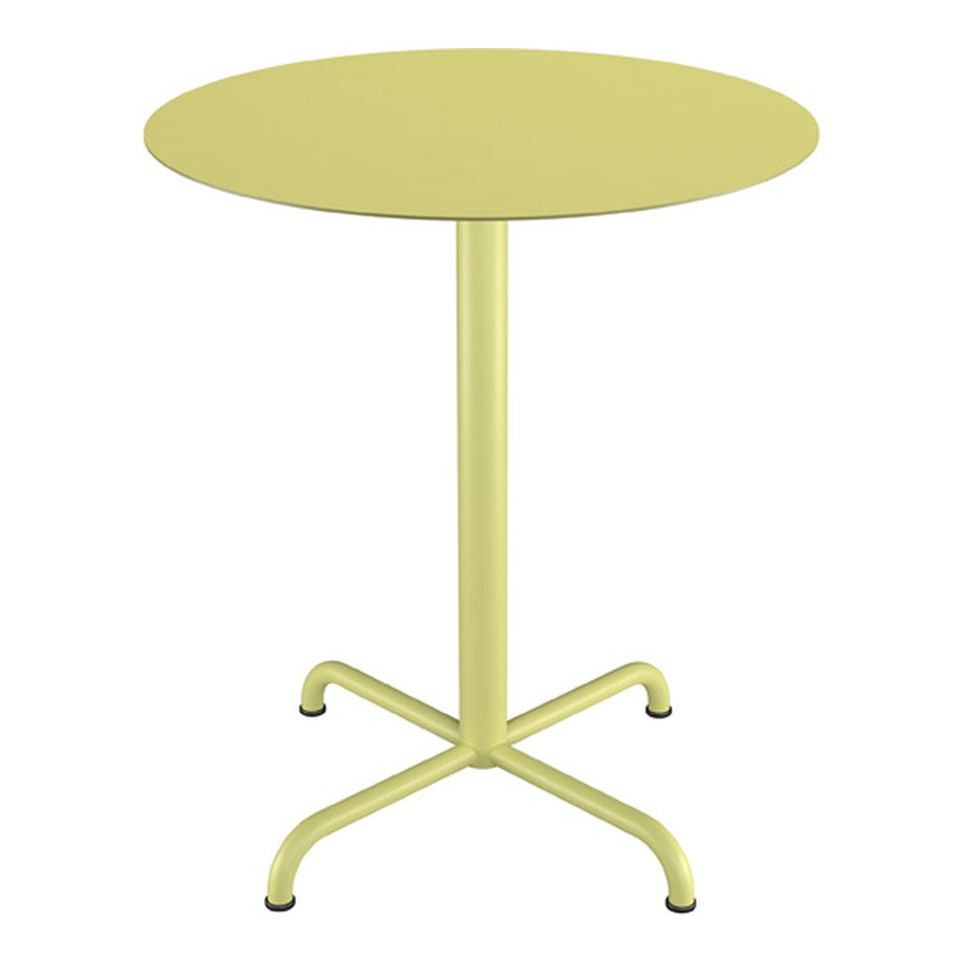 Round table in soft yellow with a smooth surface and minimalist design, featuring a sturdy cross base.