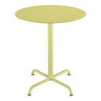 Round table in soft yellow with a smooth surface and minimalist design, featuring a sturdy cross base.