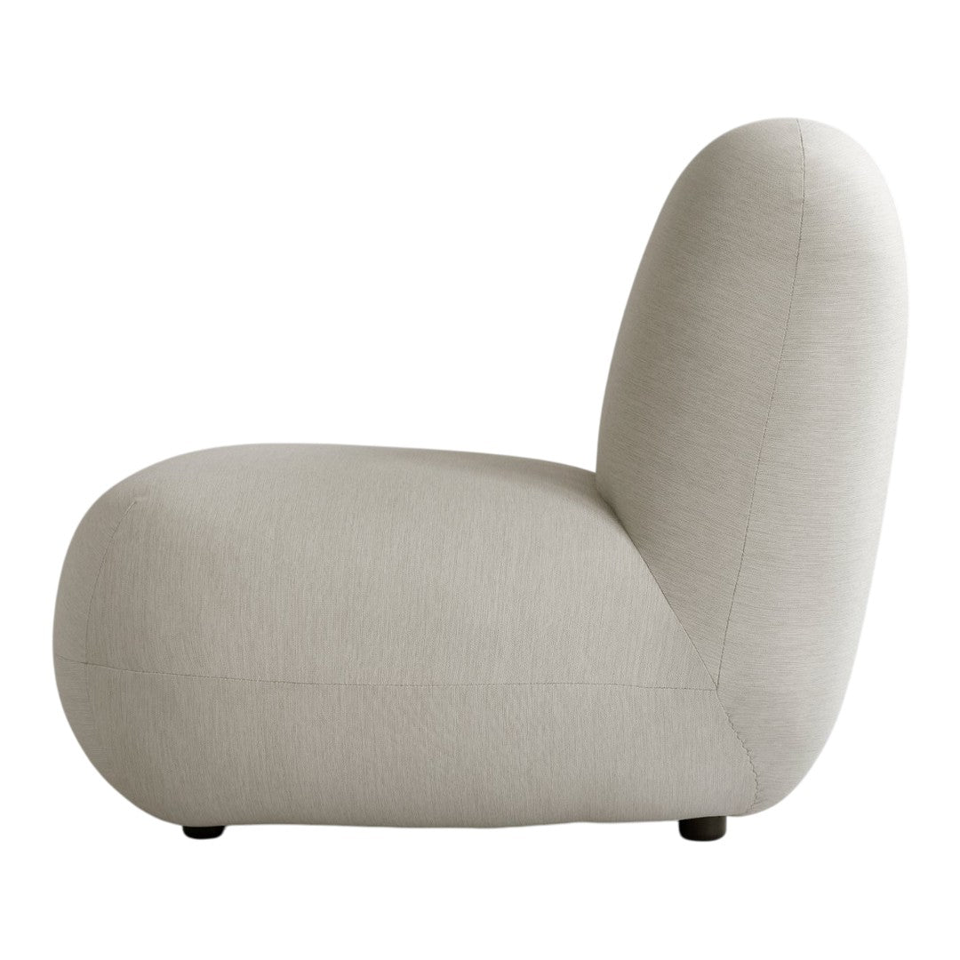 Beige textured sofa with a smooth, minimalistic design and rounded edges. Perfect for modern decor.