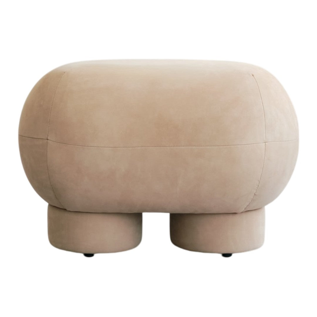 Soft beige ottoman with a smooth, matte finish and rounded, organic shape. Ideal for contemporary decor.