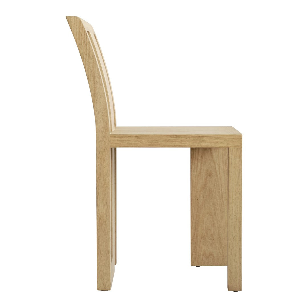Light oak wooden chair with a smooth, natural finish and clean, minimalistic lines.