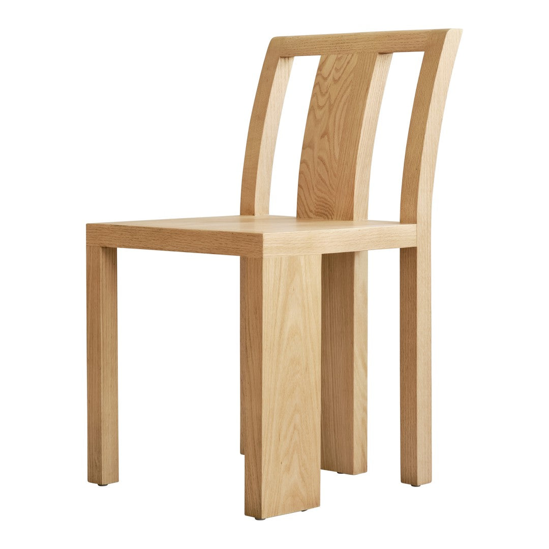 Light oak wooden chair with a smooth finish and simple, modern design. Natural wood grain patterns add elegance.