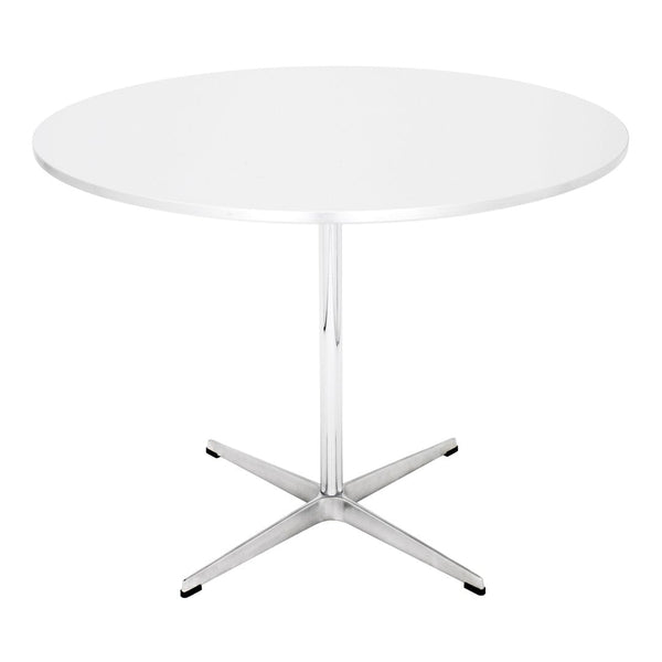 White round table with a sleek chrome base, perfect for modern dining or workspace decor.