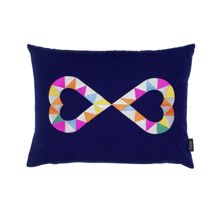 Navy pillow featuring a vibrant, multicolored infinity heart pattern in geometric shapes. Stylish and artistic decor.