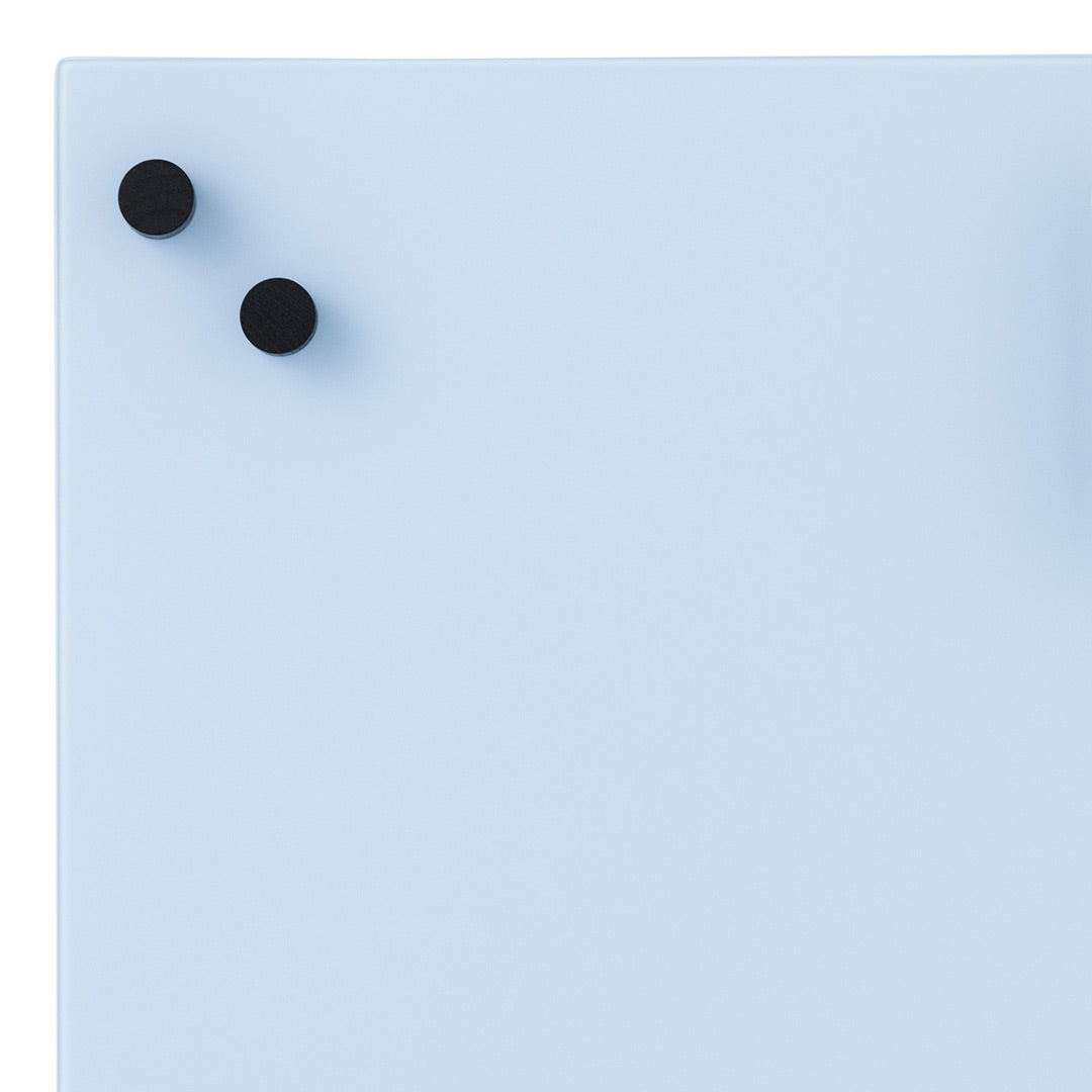 Light blue surface with two black round knobs, perfect for modern decor and organizational style.