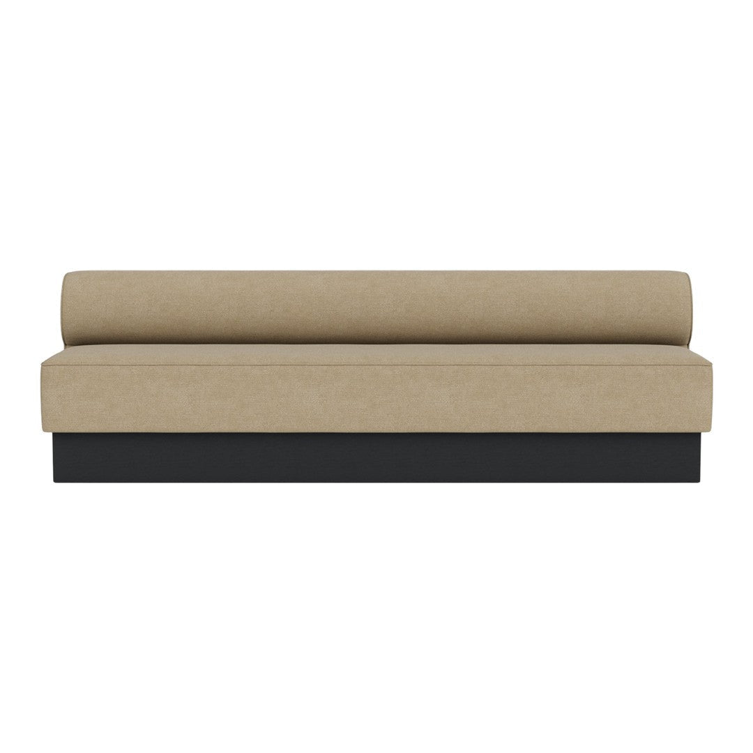 Beige upholstered sofa with a sleek black base, featuring a minimalist design and a smooth, solid pattern.