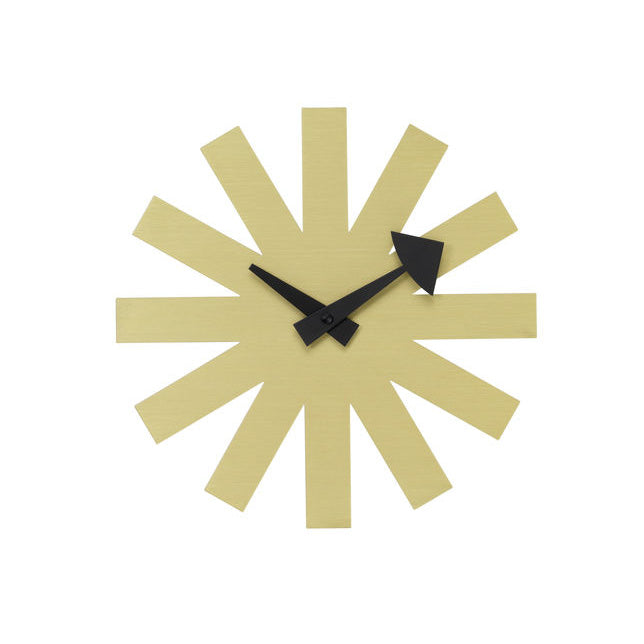 Yellow starburst clock with black accents and geometric pattern, perfect for modern decor.