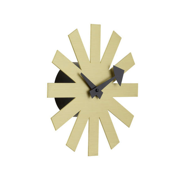 Stylish yellow starburst wall clock with black accents and geometric patterns for modern decor.