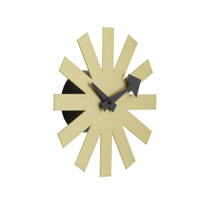Stylish yellow starburst wall clock with black accents and geometric patterns for modern decor.