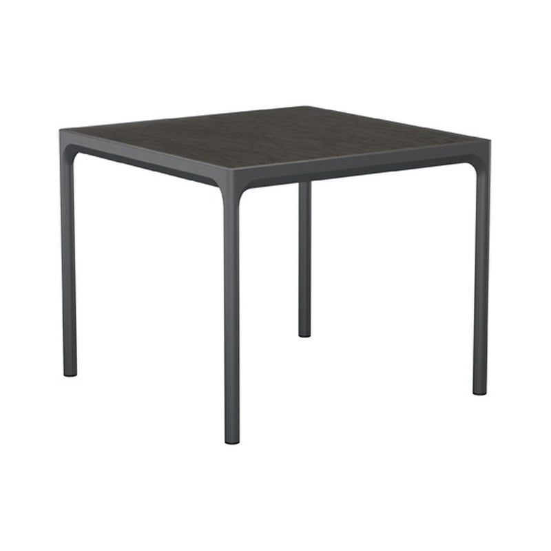 Square black table with a sleek finish and minimalist design, featuring clean lines and a solid color. Perfect for modern decor.