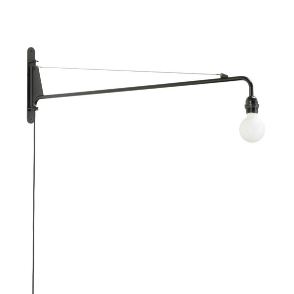 Black wall-mounted light fixture with a white globe bulb for a sleek, modern look. Perfect for minimalist decor.