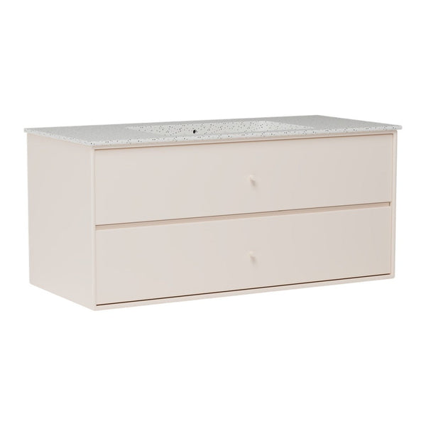 Light pink storage dresser with a patterned white top and two spacious drawers. Elegant and modern design.